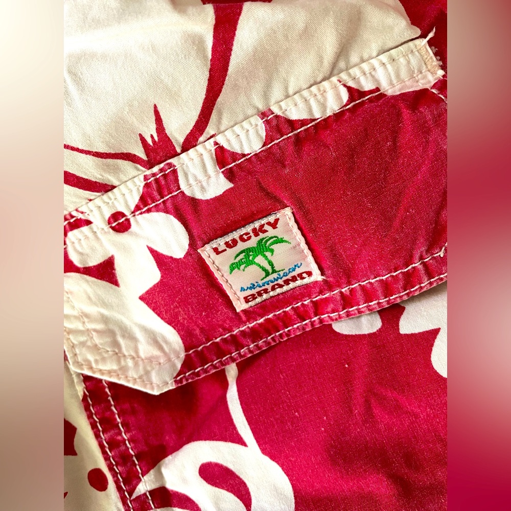 Red Pareau Hibiscus Hawaiian print Lucky Brand Dungarees by Gene Montesano.